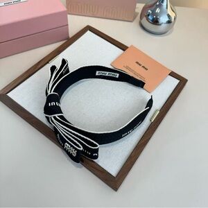 Miu Miu Elegant Black and White Bow Headband